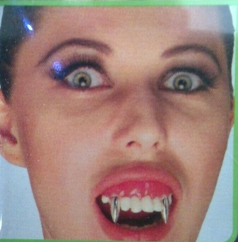 VAMP TEETH W/ SLVR FANGS